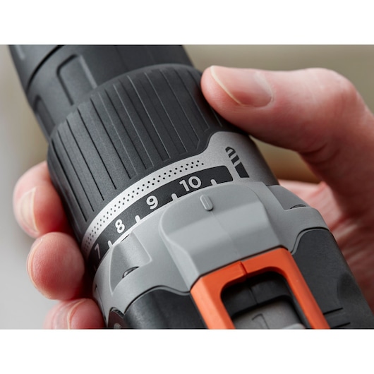 Close-up photo of BLACK+DECKER cordless drill BCD003C2K, showing adjustable torque settings and grip.