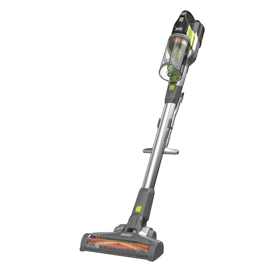 BLACK+DECKER cordless stick vacuum cleaner with transparent dust container, angled brush head, and grey and green color accents, shown against a white background.
