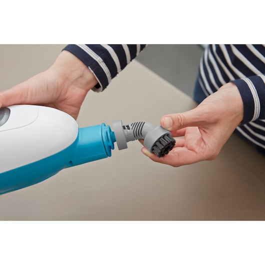 BLACKDECKER FSMH13E10 steam cleaner nozzle and brush attachment shown in close-up photography.
